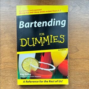 Bartending For Dummies a great book for recipes, with basic bar tools.
